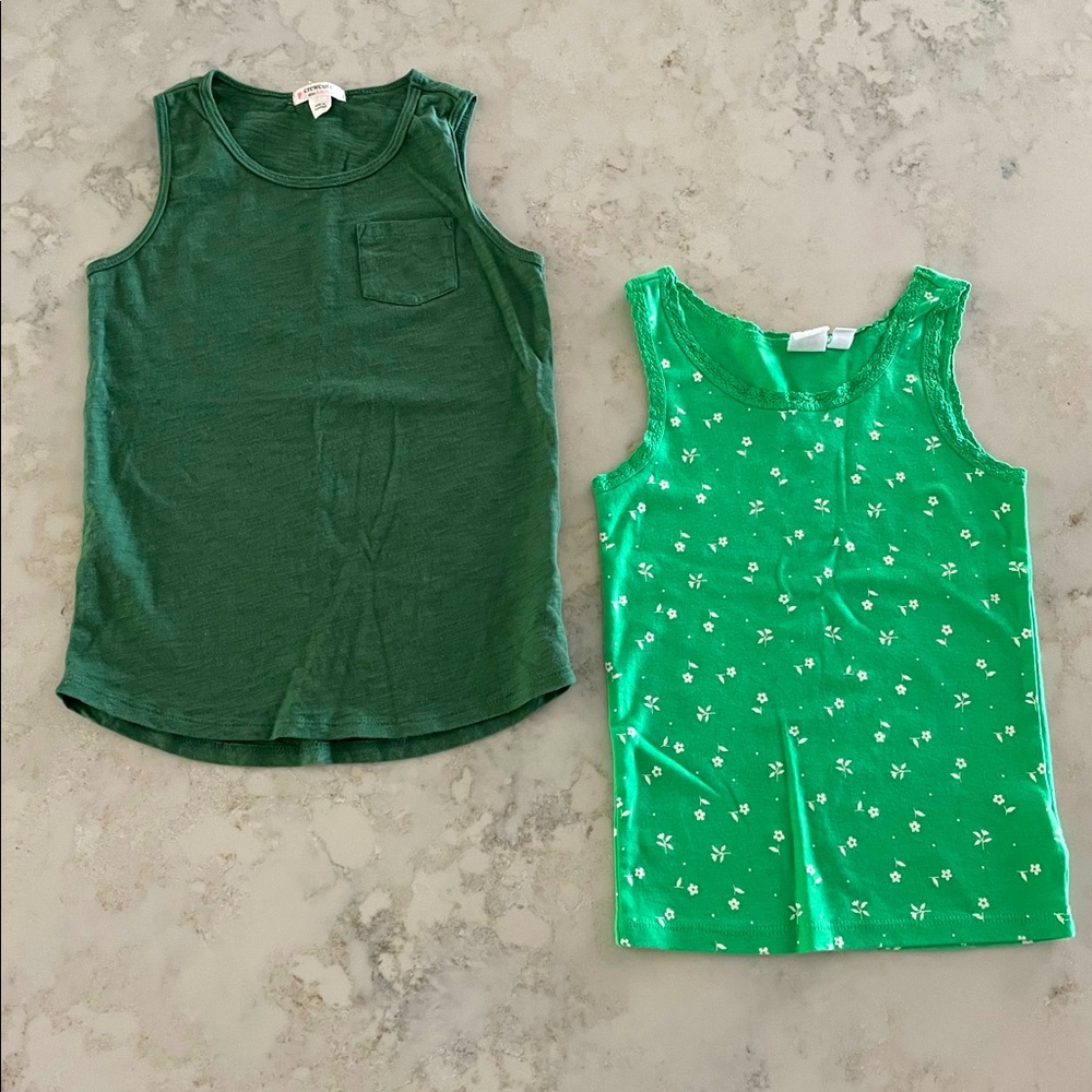Pair of green tanks: Solid pocket, white flowers